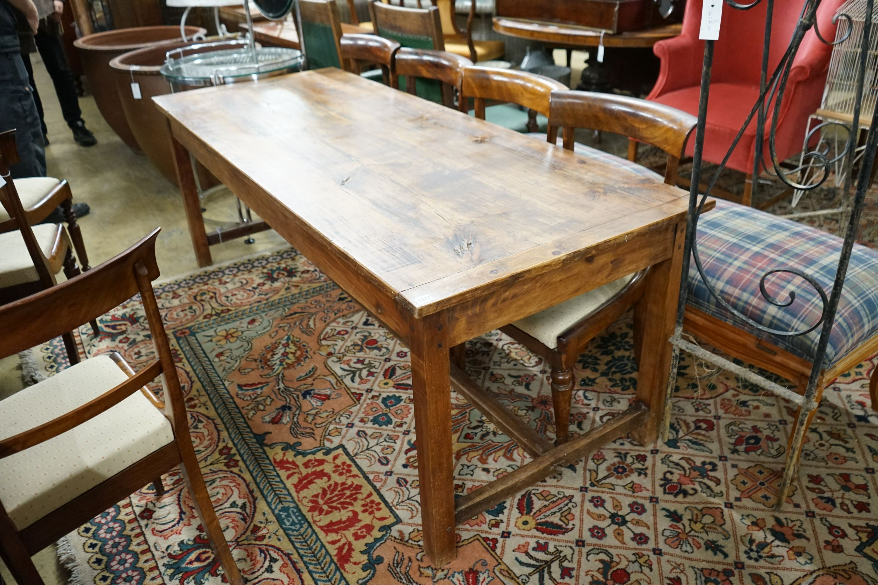 A 19th century French pine and fruitwood rectangular kitchen table, length 200cm, width 79cm, height 73cm